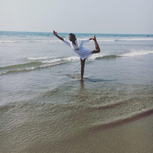 yoga white dress sea beach Goa India